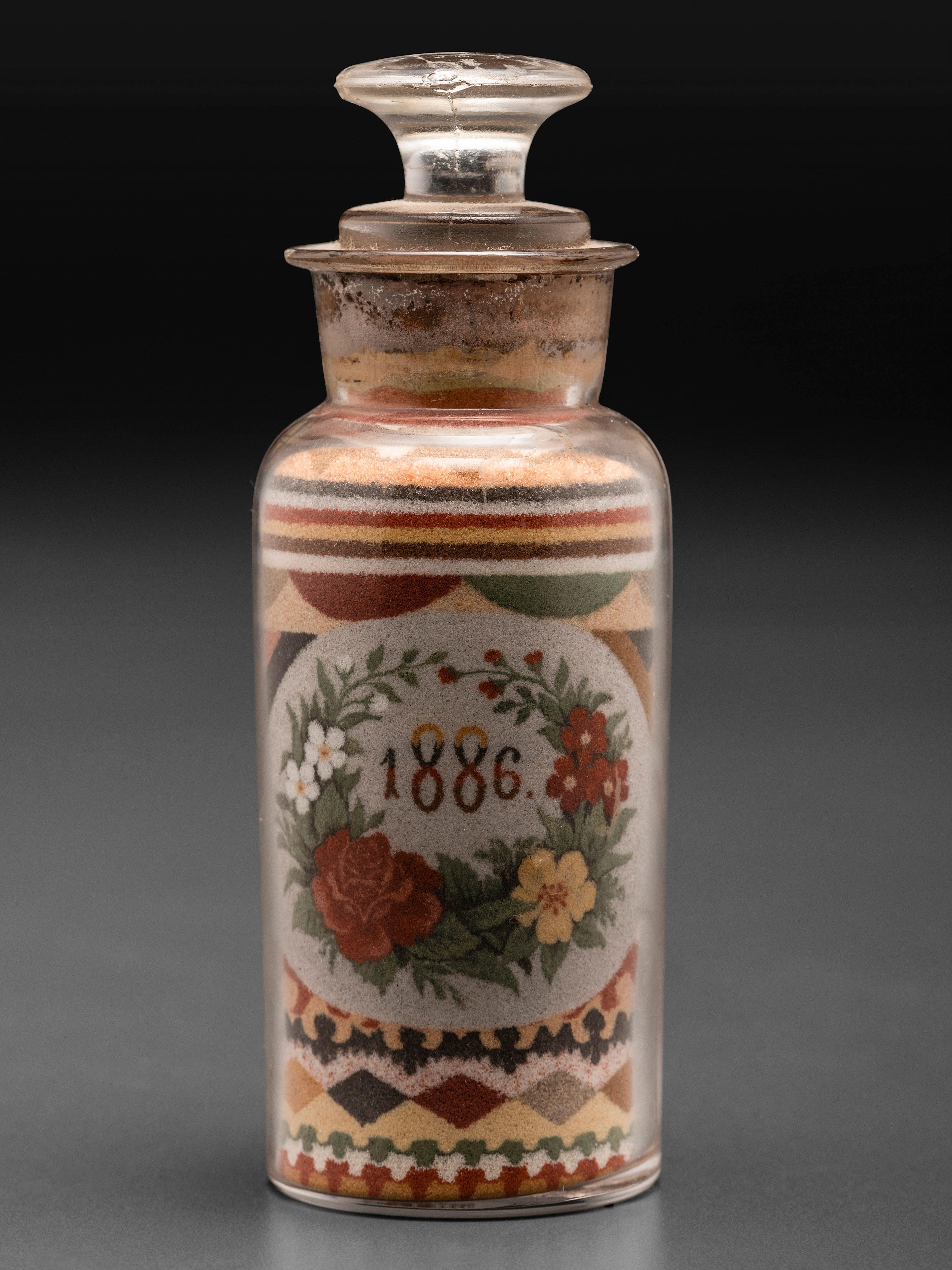 An Andrew Clemens (American, 1857-1894) Eagle Sand Bottle