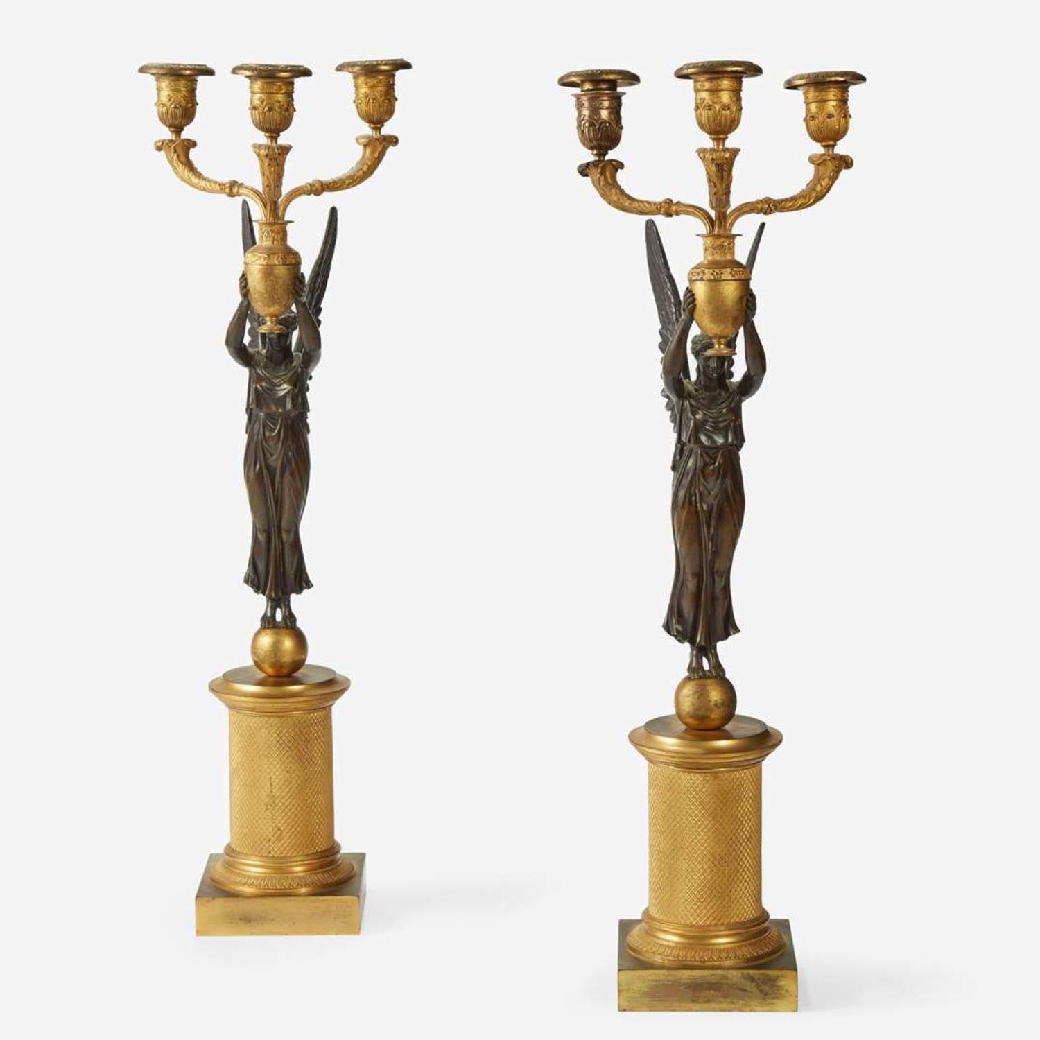 A Pair of Empire Gilt and Patinated Bronze Figural Three-Light Candelabra early 19th century