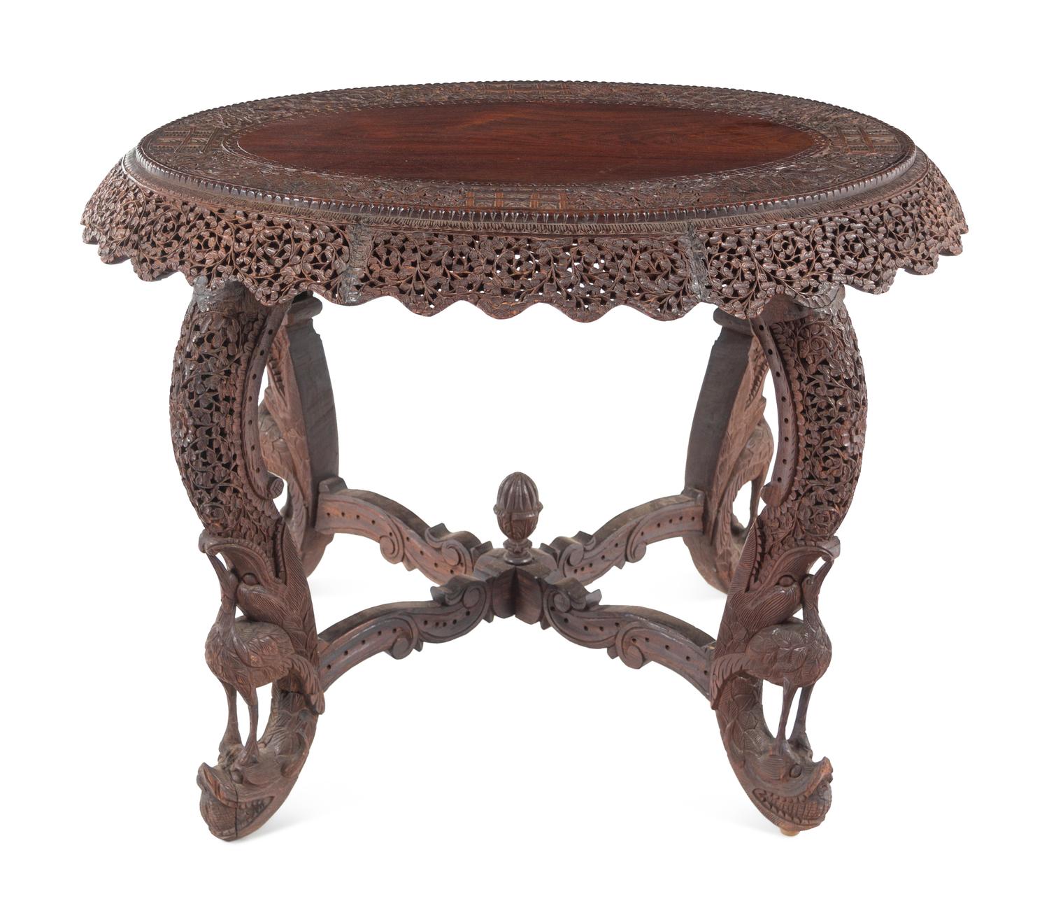 An Anglo-Indian Carved Teakwood Table