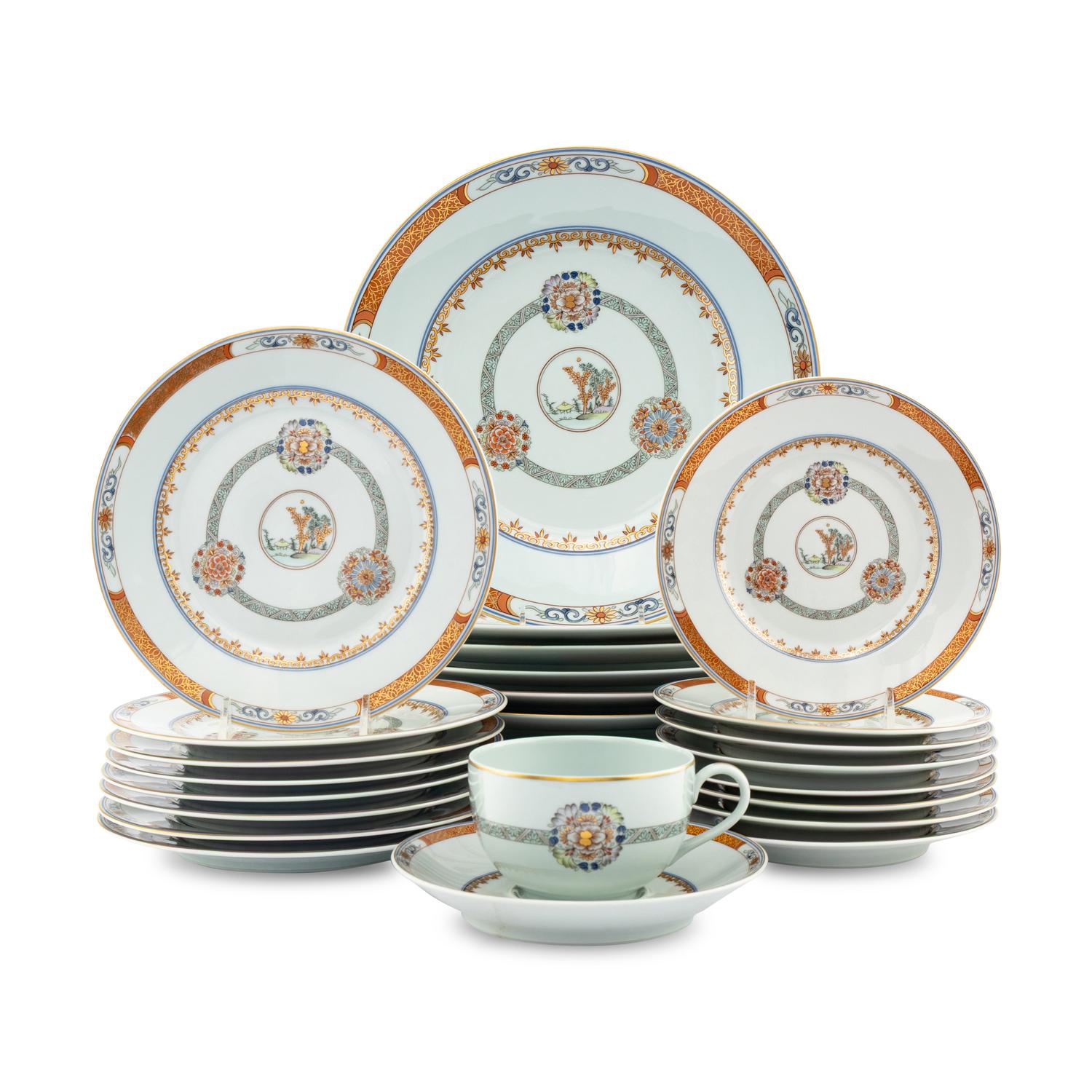 A Raynaud-Limoges Porcelain Dinner Service