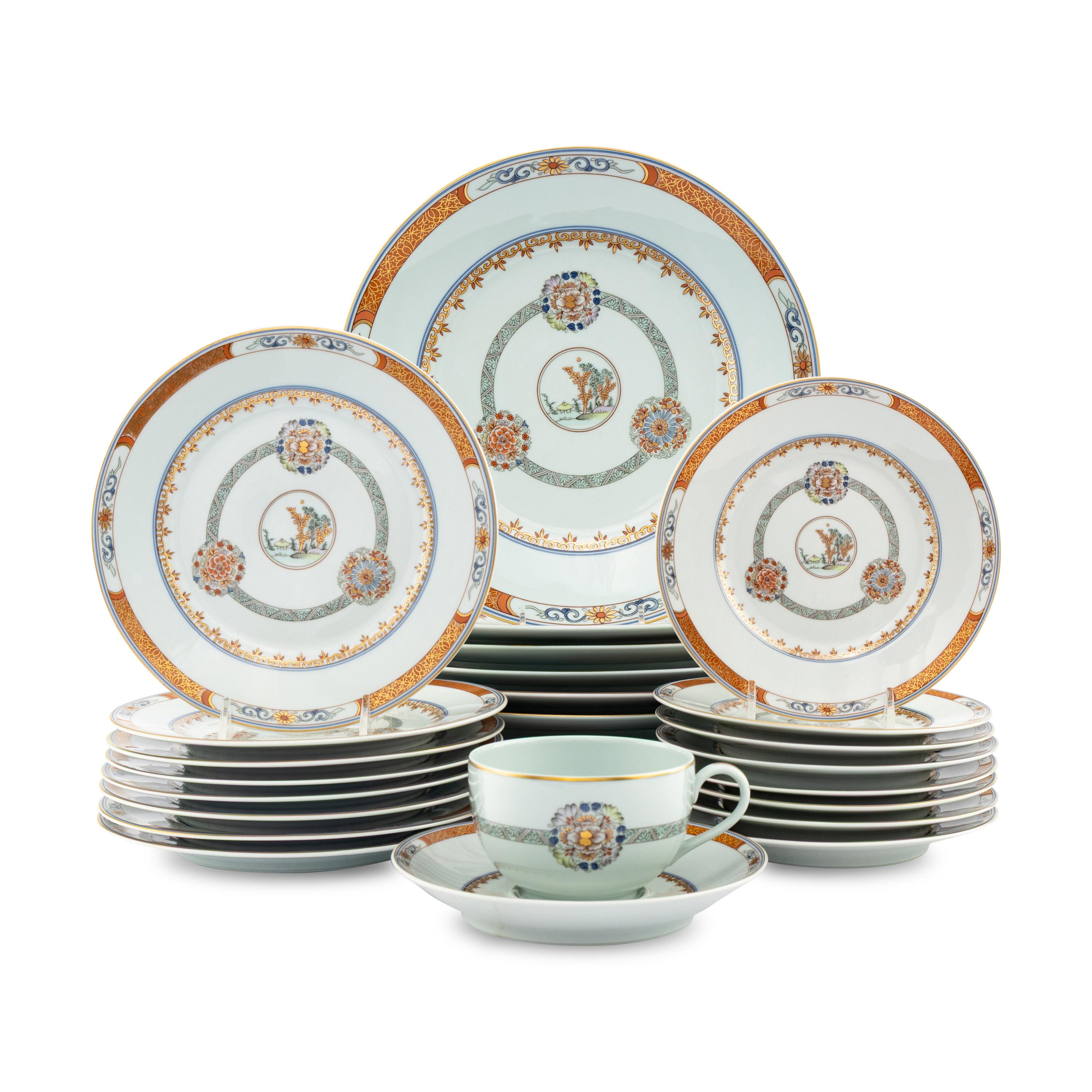 A Raynaud-Limoges Porcelain Dinner Service