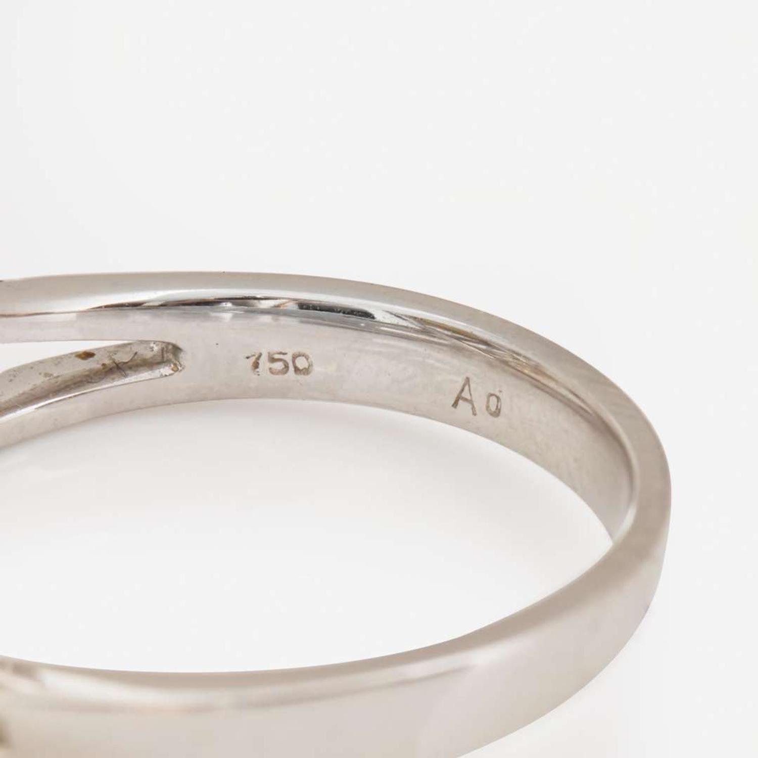 A Collection of Three Contemporary Gold and Gemstone Rings
