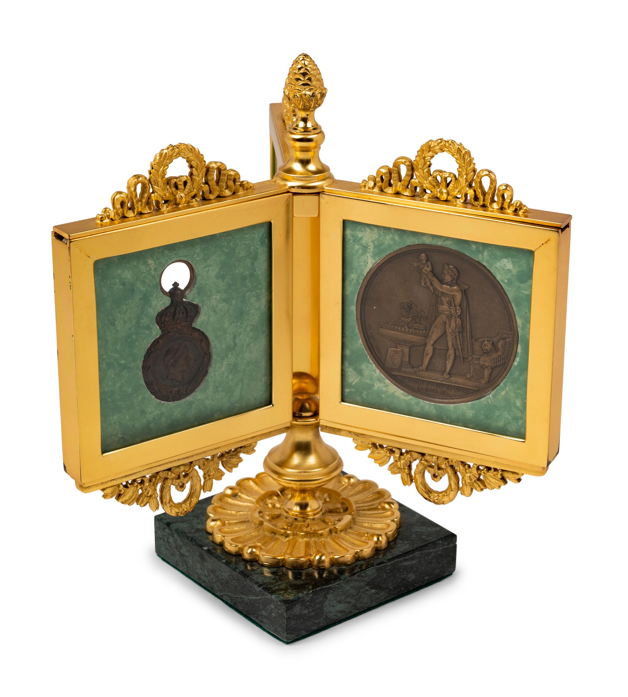 An Empire Style Gilt Bronze Tripartite Frame on Stand