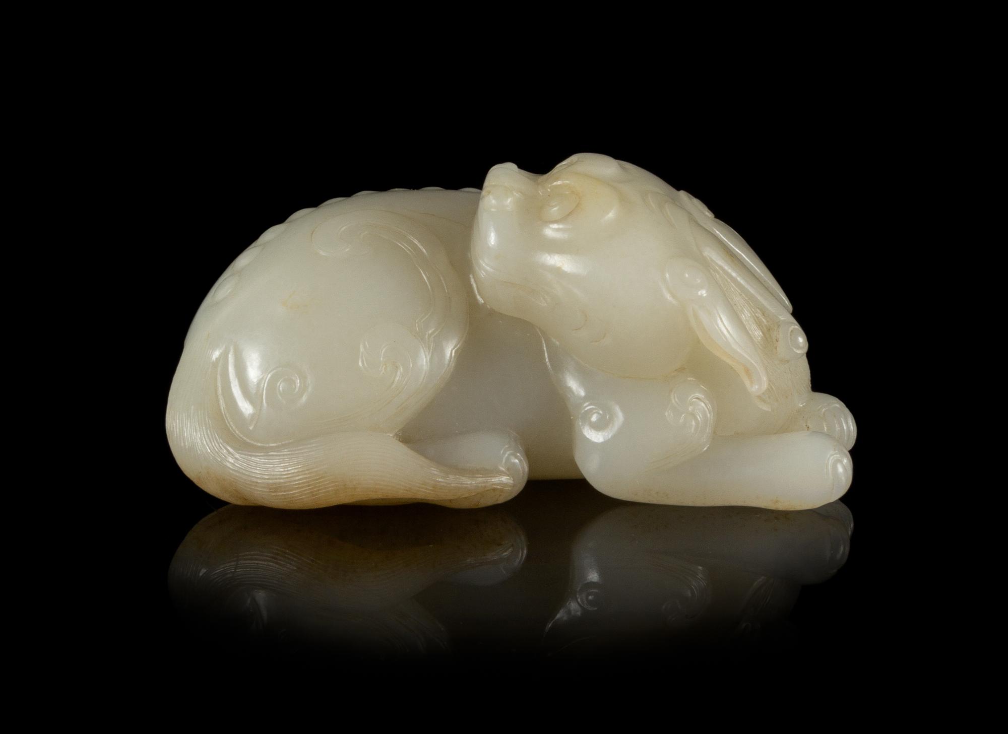 A Near-White Jade Figure of a Qilin Length 3 1/2 inches.