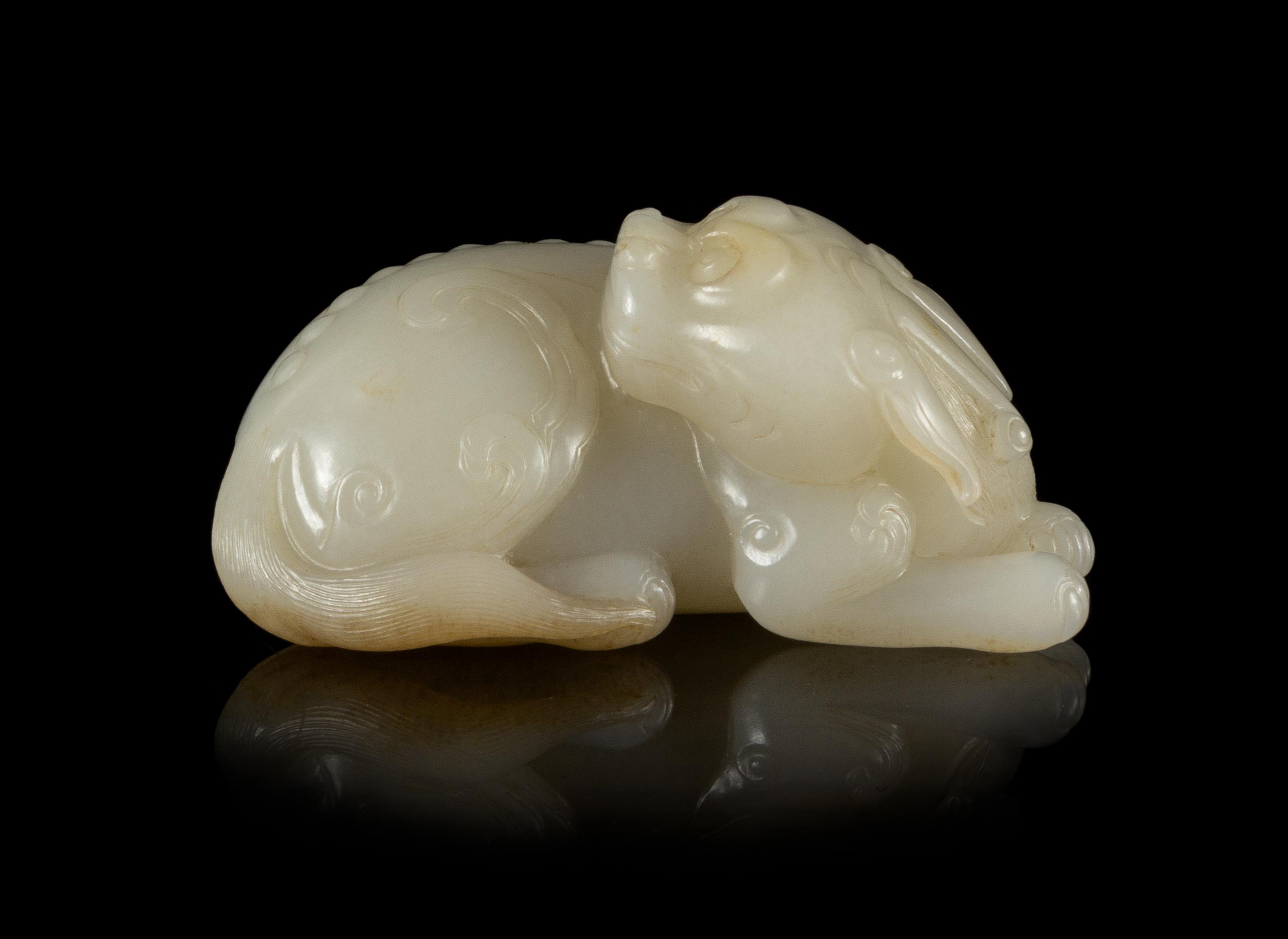 A Near-White Jade Figure of a Qilin Length 3 1/2 inches.