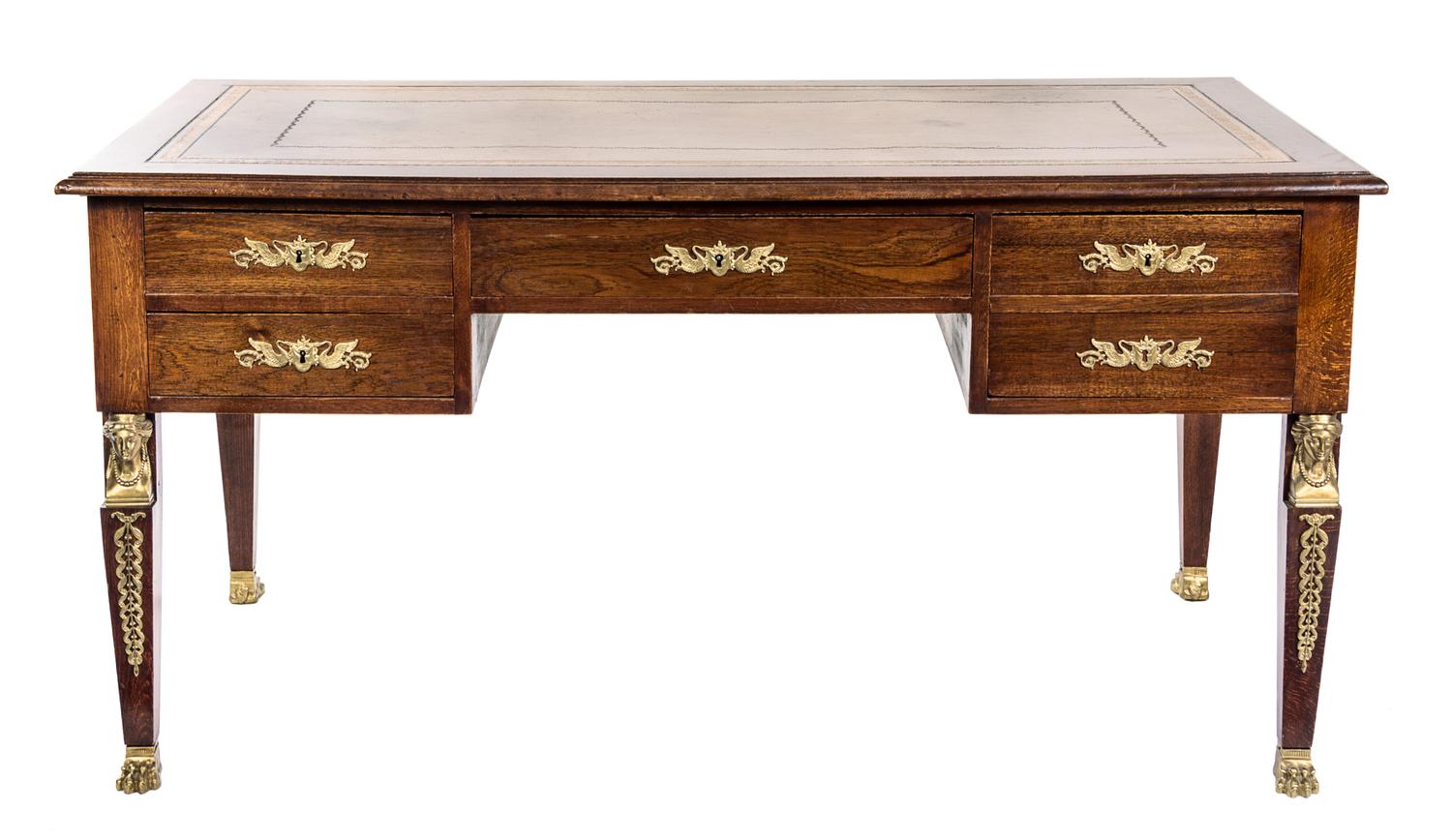 An Empire Style Gilt Bronze Mounted Oak Bureau Plat Height 29 1/2 x width 59 x depth 31 1/2 inches. — LATE 19TH CENTURY