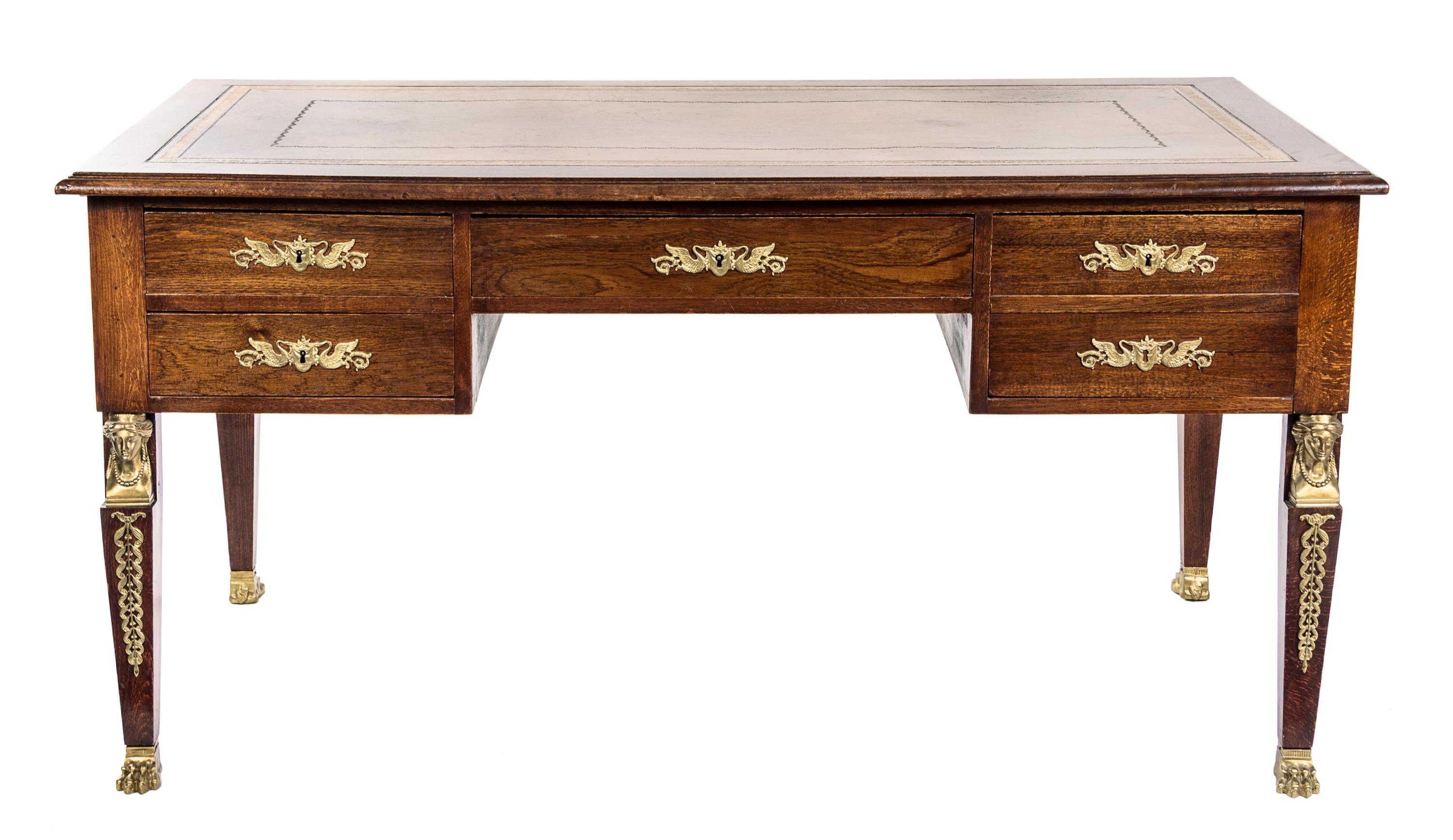 An Empire Style Gilt Bronze Mounted Oak Bureau Plat Height 29 1/2 x width 59 x depth 31 1/2 inches. — LATE 19TH CENTURY