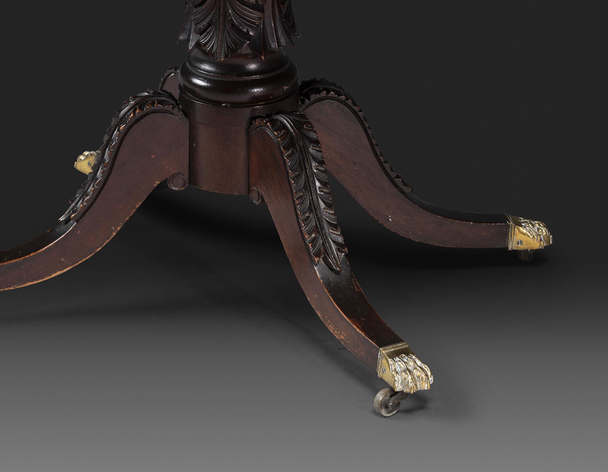 A Classical Carved and Brass Mounted Mahogany Claw-Foot Card Table