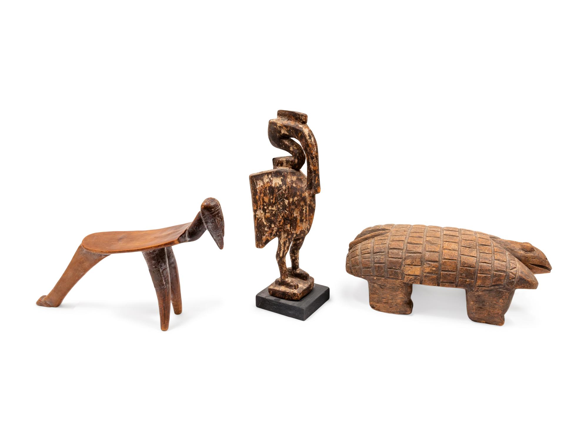 A Group of Carved Wooden African Objects