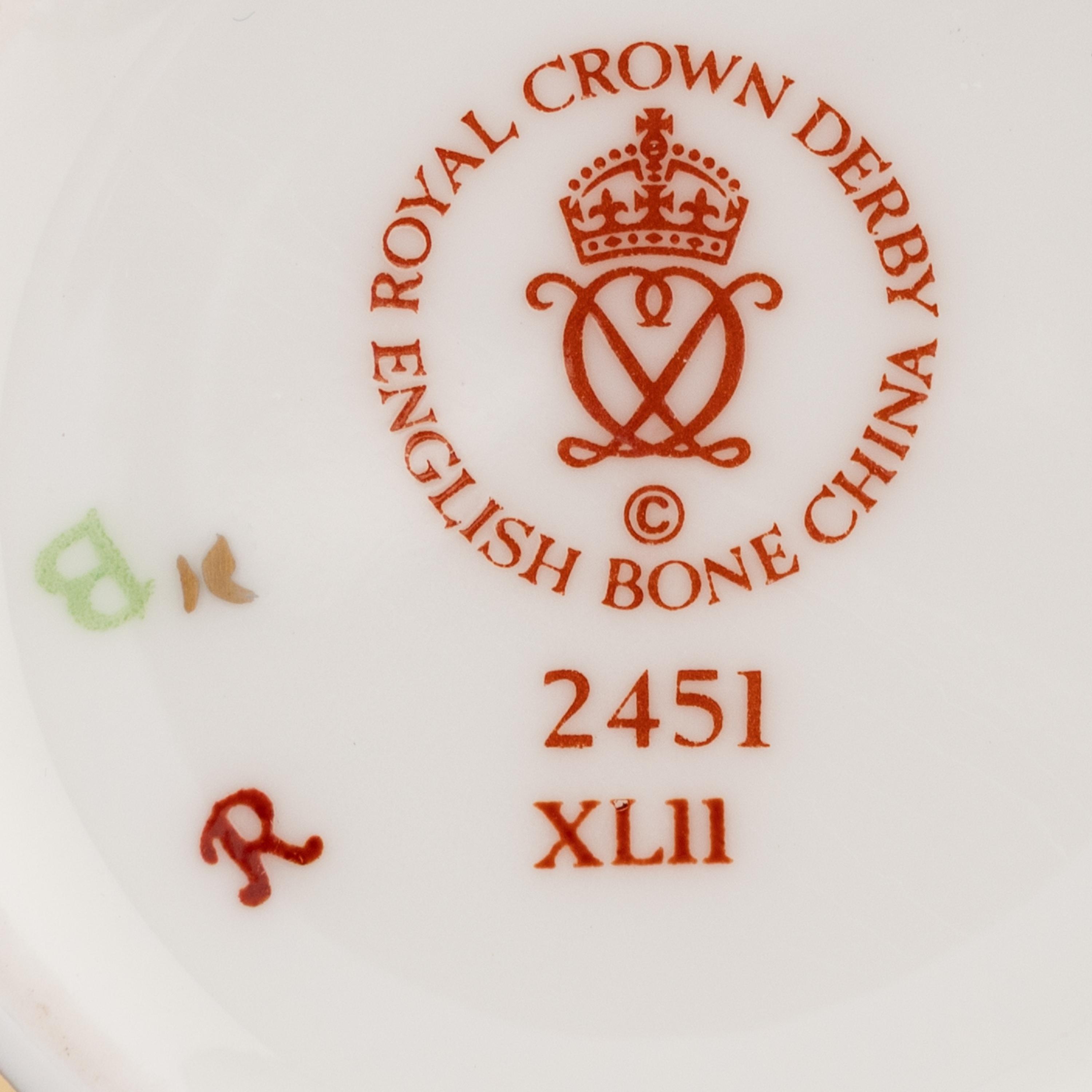 A Group of Royal Crown Derby Porcelain Teacups and Saucers