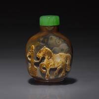 A Chinese Carved Agate "Tethered Horse" Snuff Bottle, Late Qing Dynasty — 清晚期 瑪瑙巧雕駿馬圖鼻煙壺