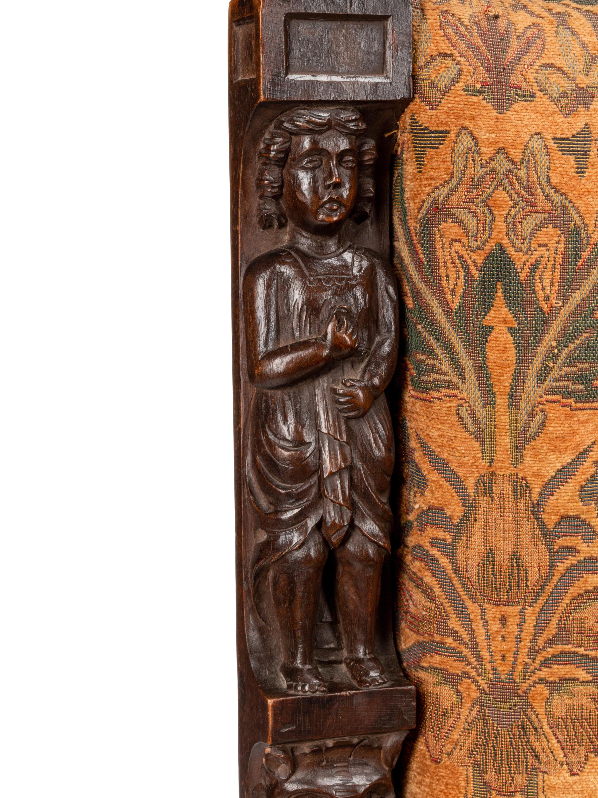 A Pair of Flemish Baroque Style Carved Walnut Armchairs