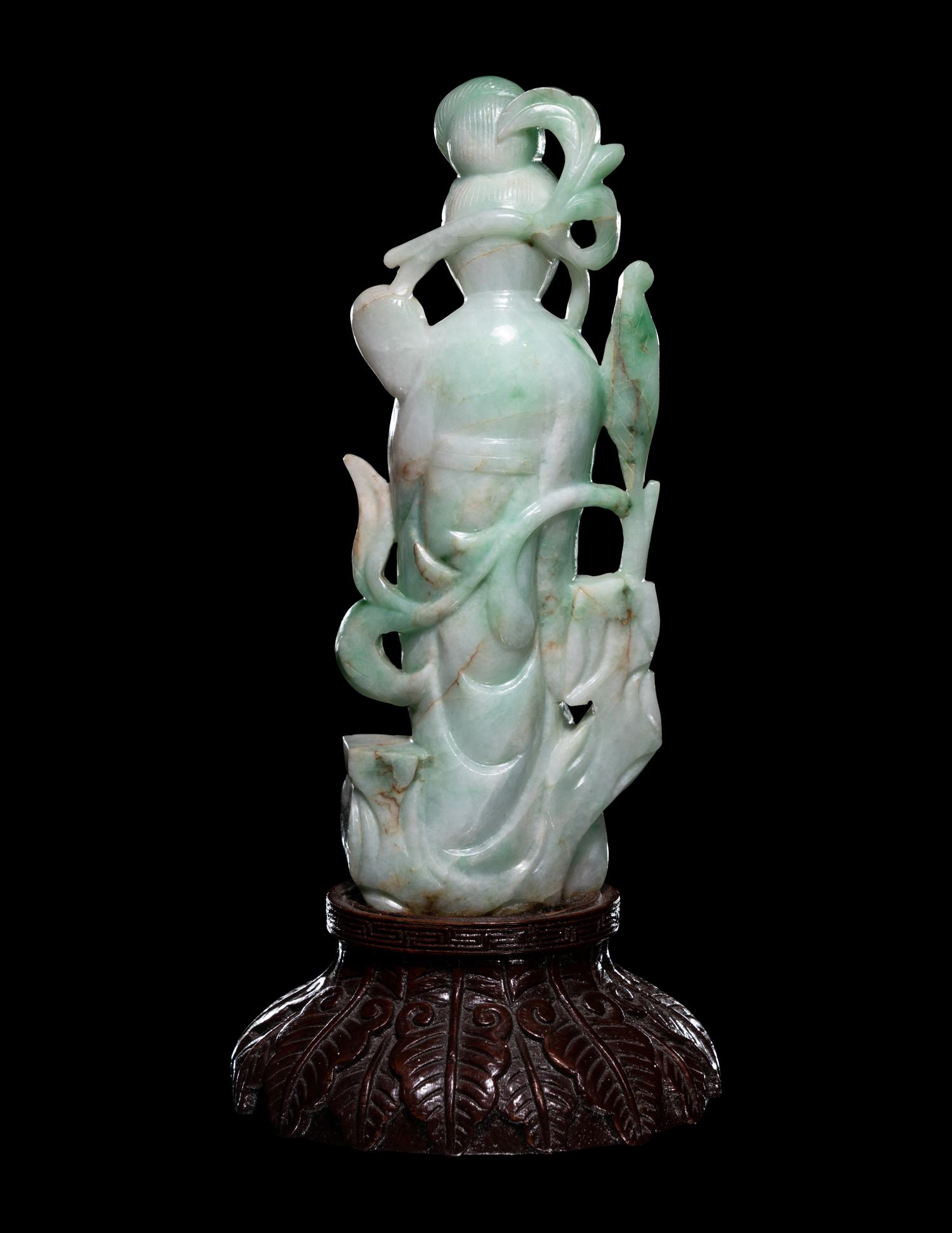 A Chinese Apple Green and Celadon Figure of Female Immortal
