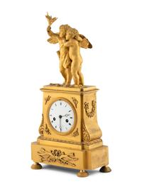 An Empire Gilt Bronze Figural Mantel Clock