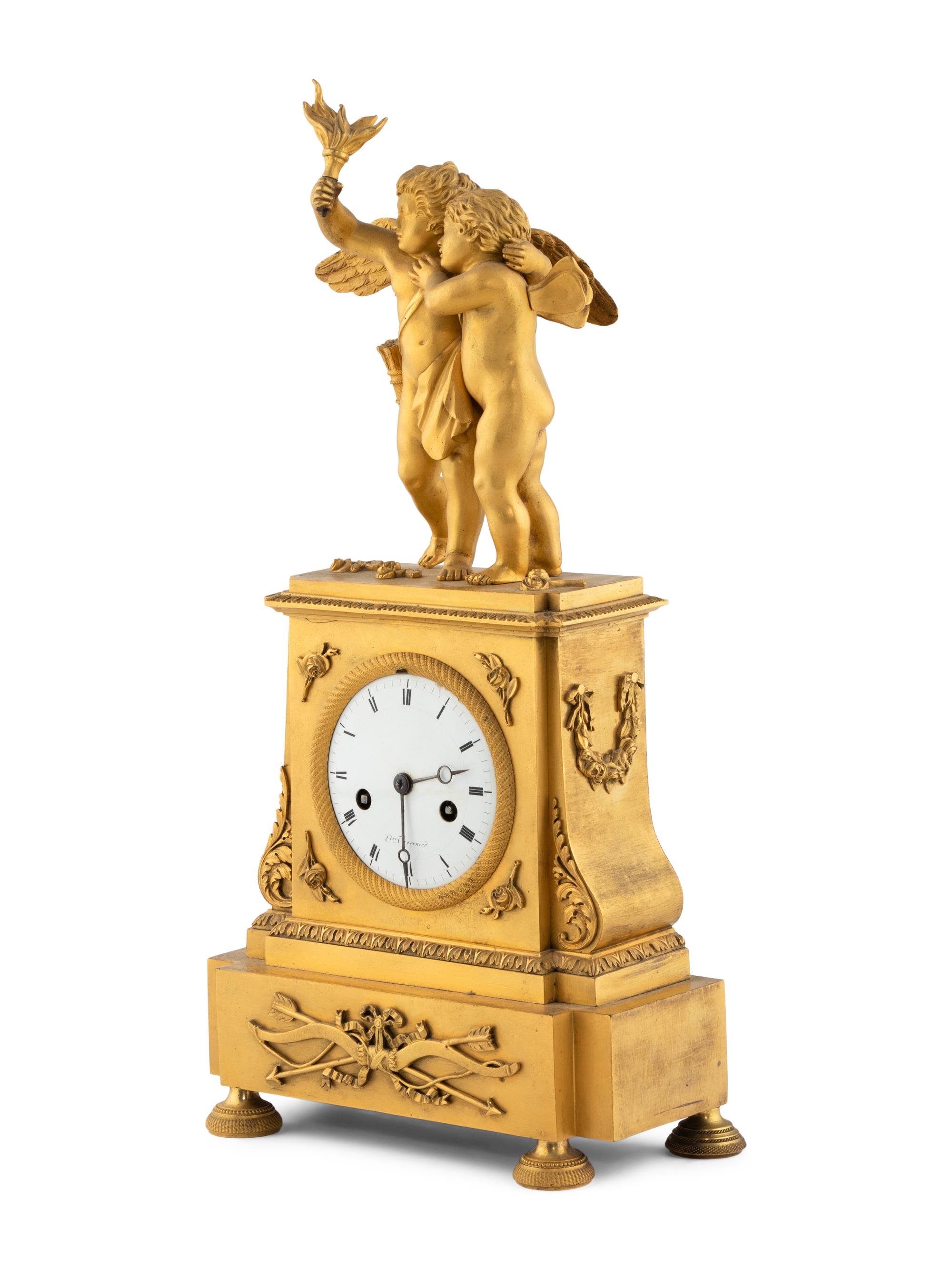 An Empire Gilt Bronze Figural Mantel Clock