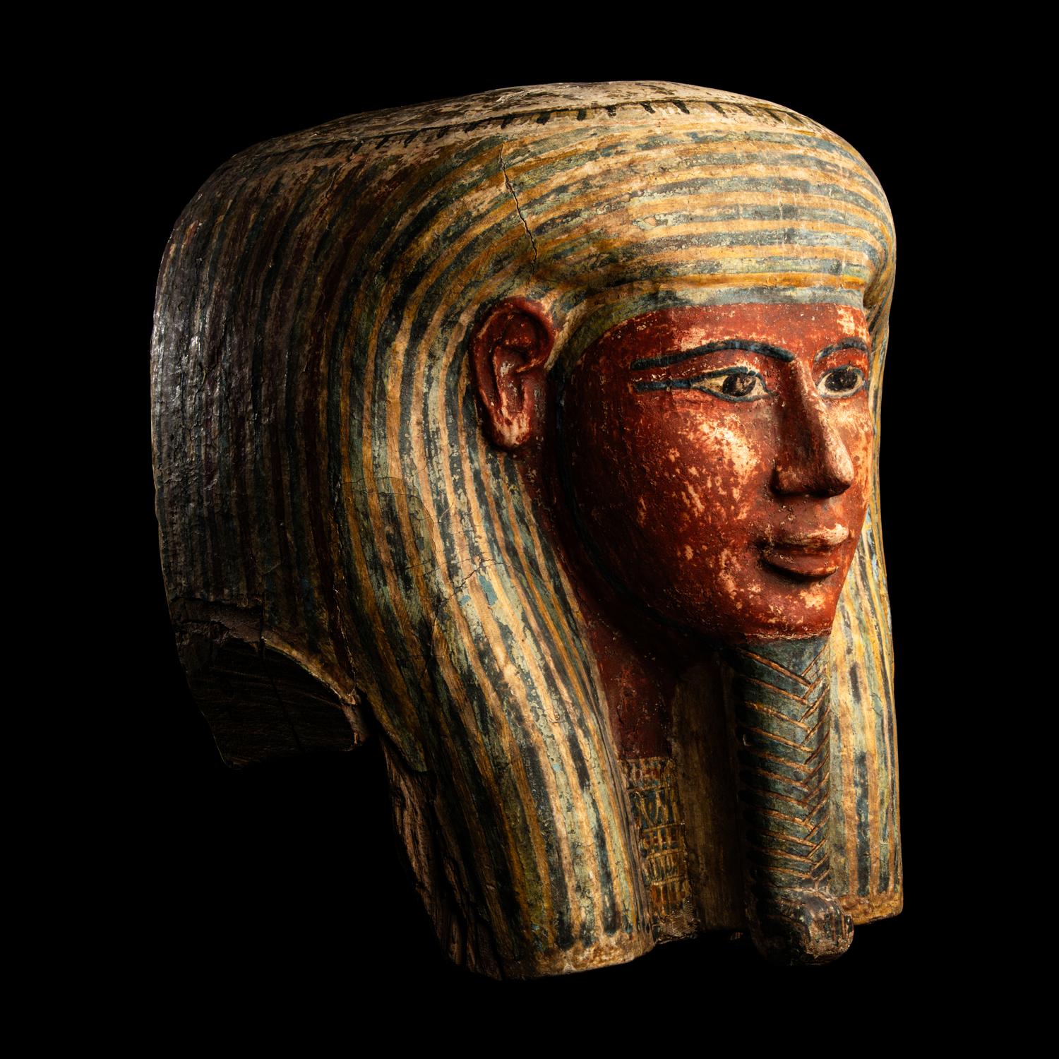 An Egyptian Polychrome Wood Mummy Mask
