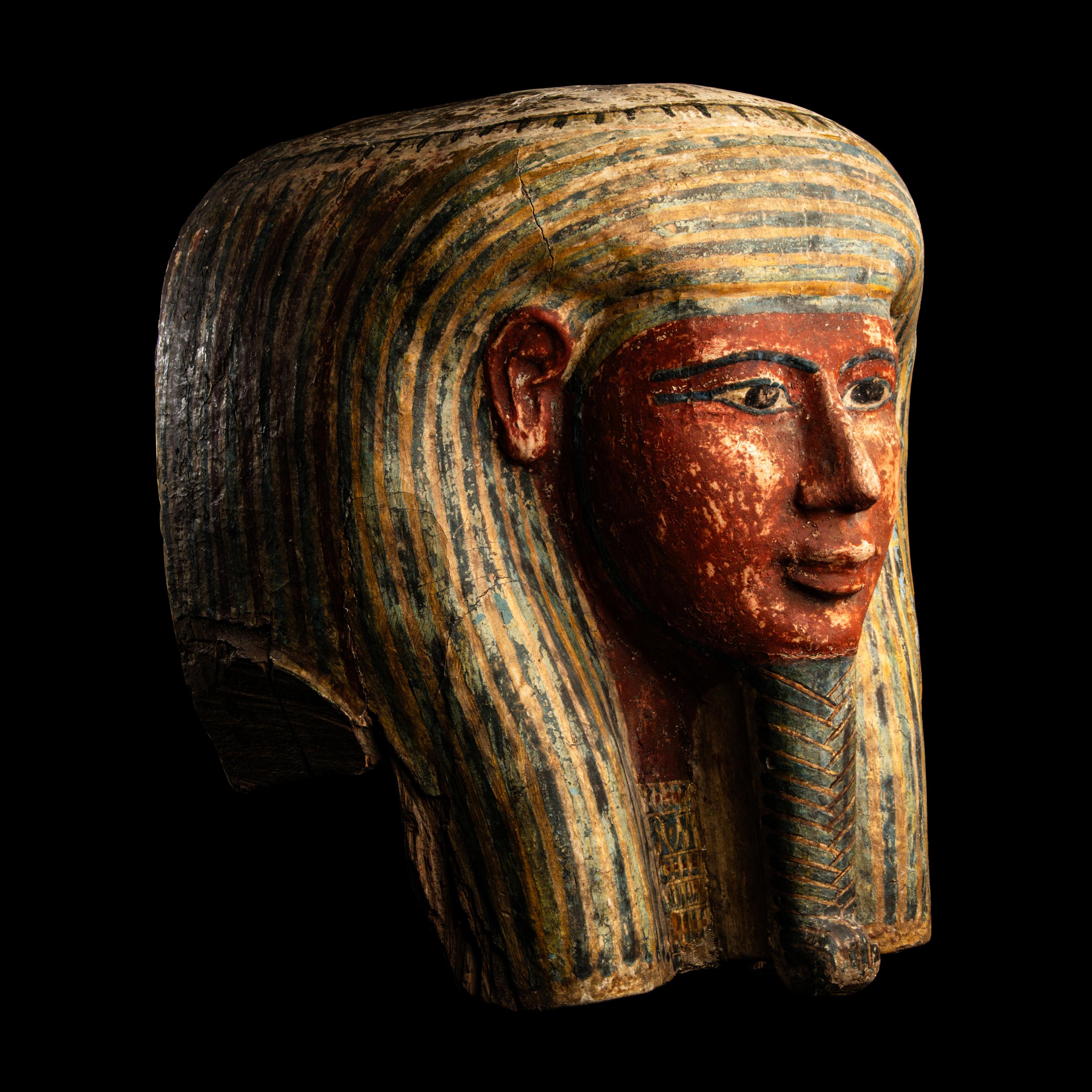 An Egyptian Polychrome Wood Mummy Mask