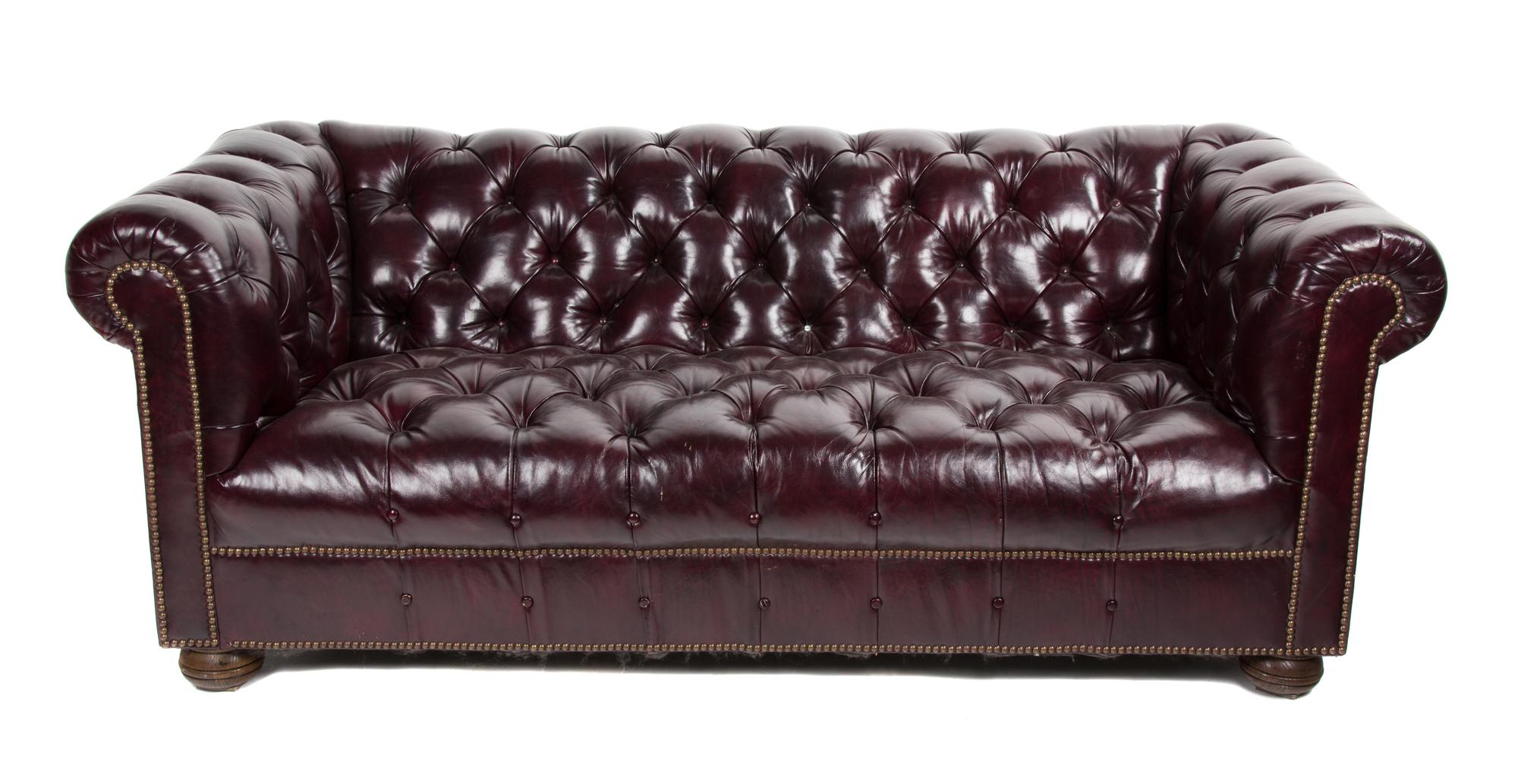A Chesterfield Leatherette Sofa Height 28 1/2 x width 76 x depth 35 inches. — 20TH CENTURY