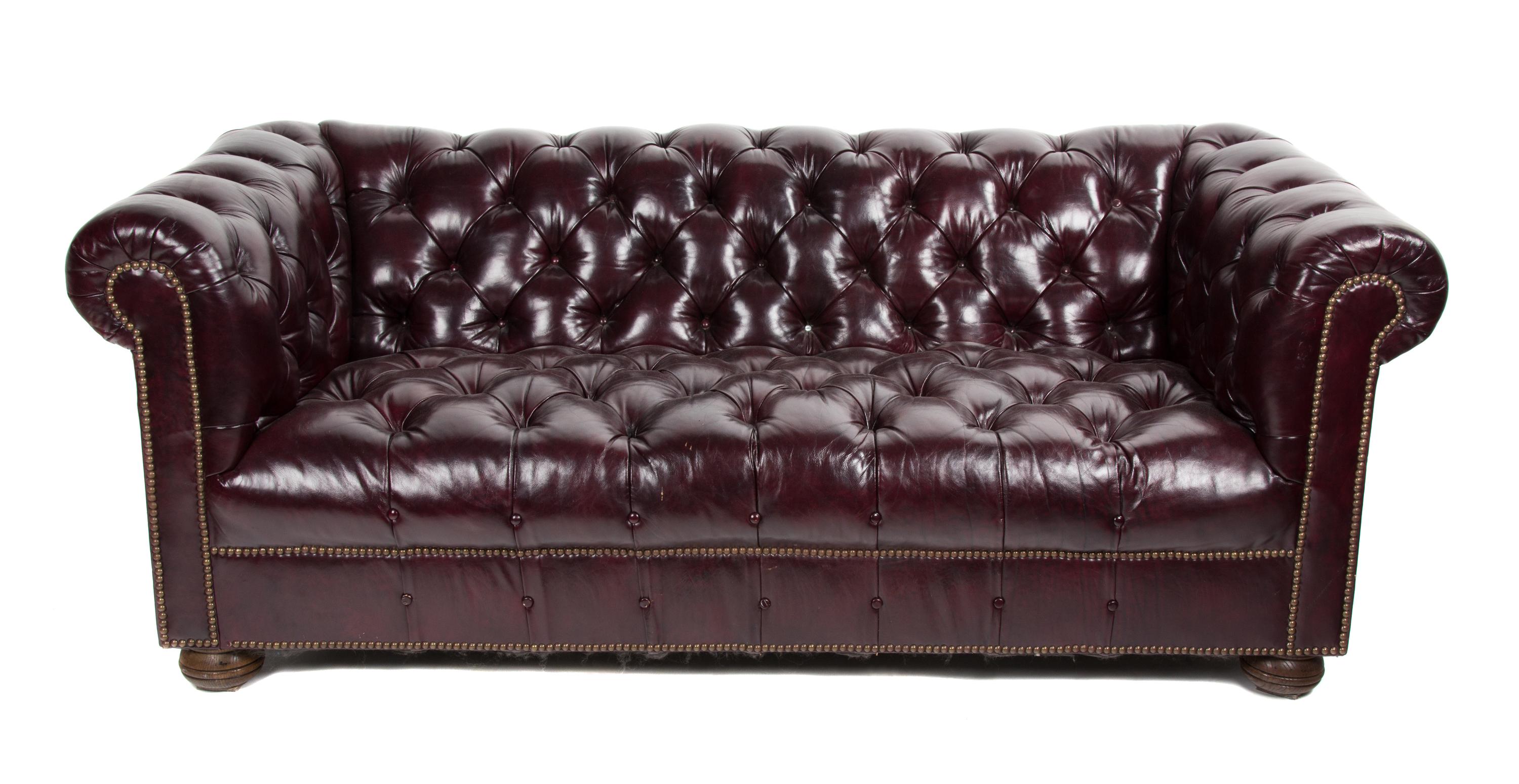 A Chesterfield Leatherette Sofa Height 28 1/2 x width 76 x depth 35 inches. — 20TH CENTURY