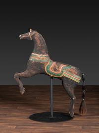An American Glass Inset, Carved and Painted Pine Carousel Horse