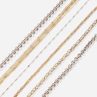 A collection of six fourteen karat gold necklaces