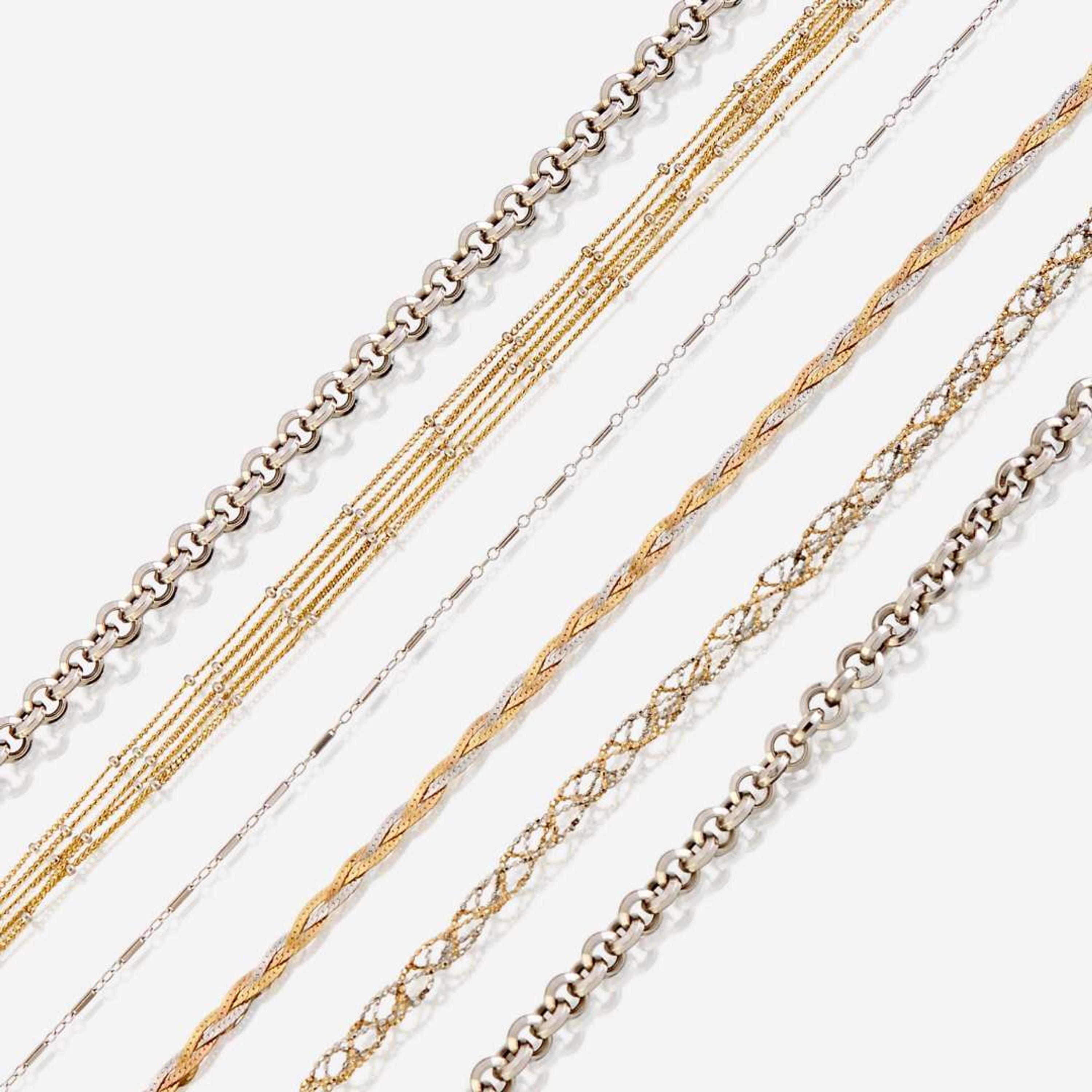 A collection of six fourteen karat gold necklaces
