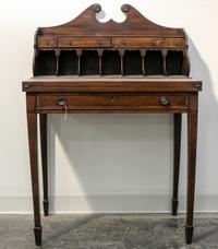A George III Mahogany Writing Table Height 44 x width 30 x diameter 17 inches. — CIRCA 1800