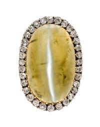A Silver Topped Gold, Cat's Eye Quartz and Diamond Brooch, Circa 1890, 6.40 dwts.