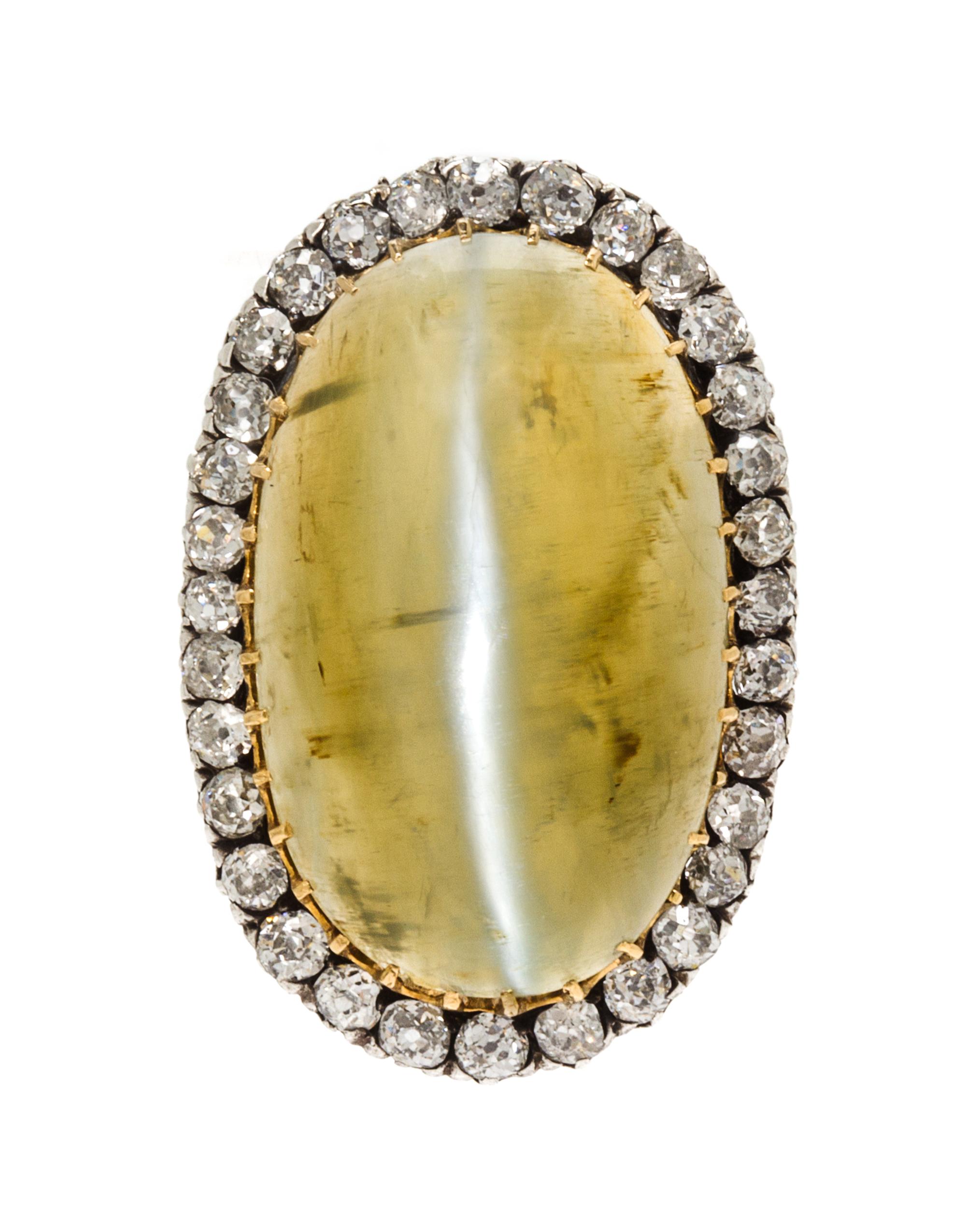 A Silver Topped Gold, Cat's Eye Quartz and Diamond Brooch, Circa 1890, 6.40 dwts.