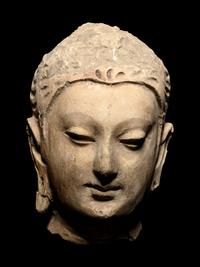 Four Gandharan Stucco Fragmented Heads