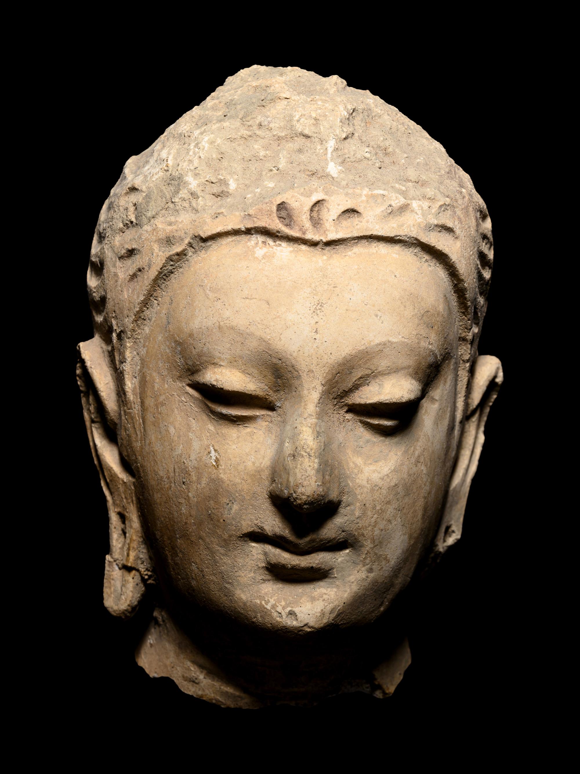 Four Gandharan Stucco Fragmented Heads