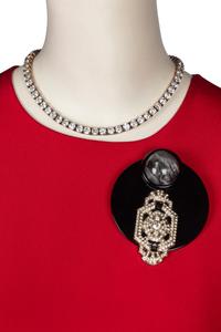 Two Gowns by Richilene and Carolina Herrera Accompanied by a Collection of Costume Jewelry