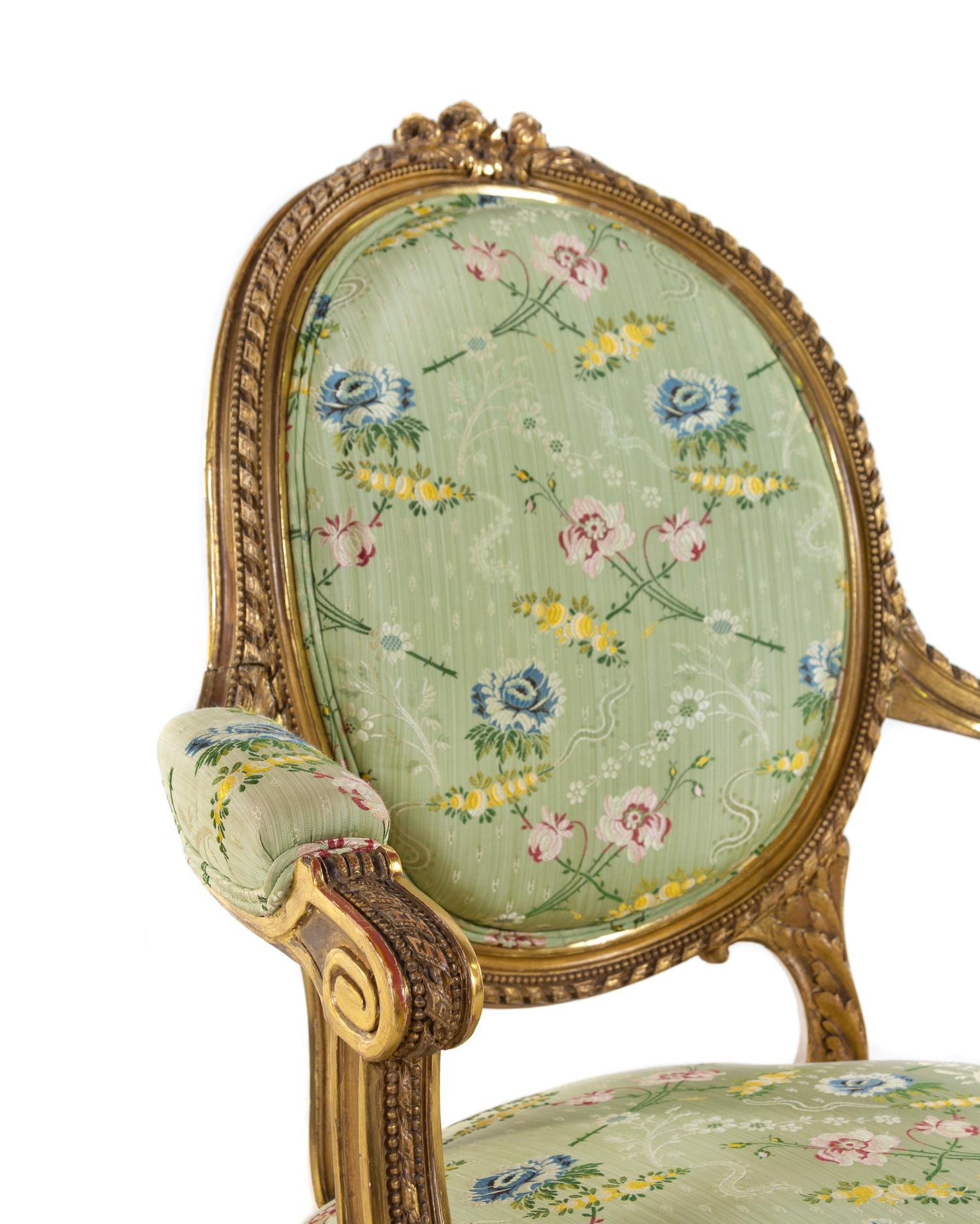 A Set of Four Louis XVI Style Carved Giltwood Fauteuils