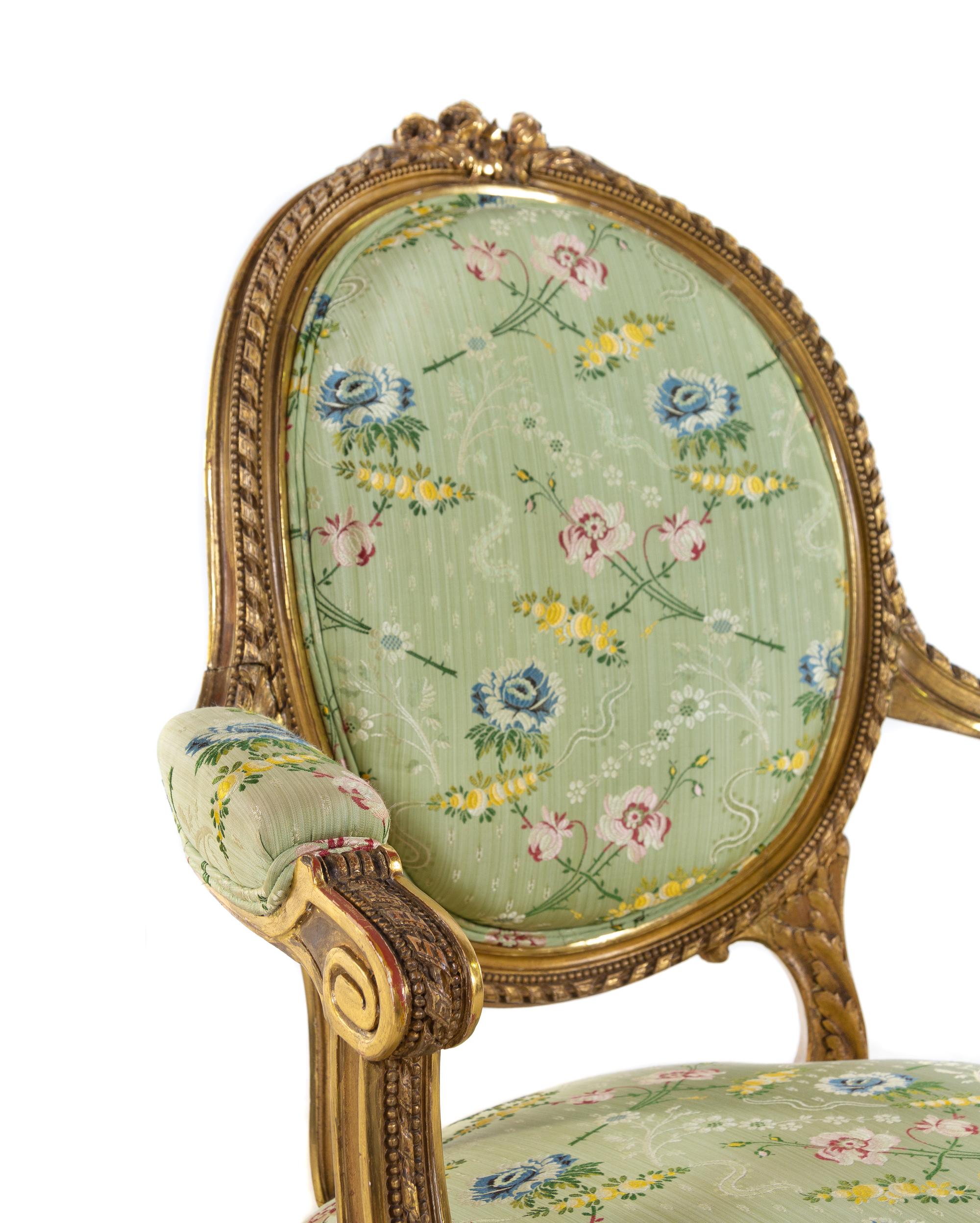 A Set of Four Louis XVI Style Carved Giltwood Fauteuils