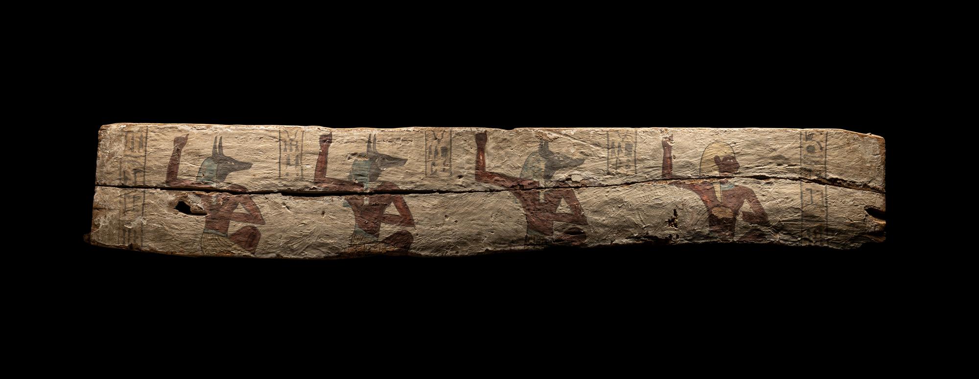 An Egyptian Painted Wood Sarcophagus Panel