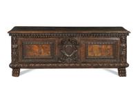 An Italian Baroque Carved Walnut Cassone