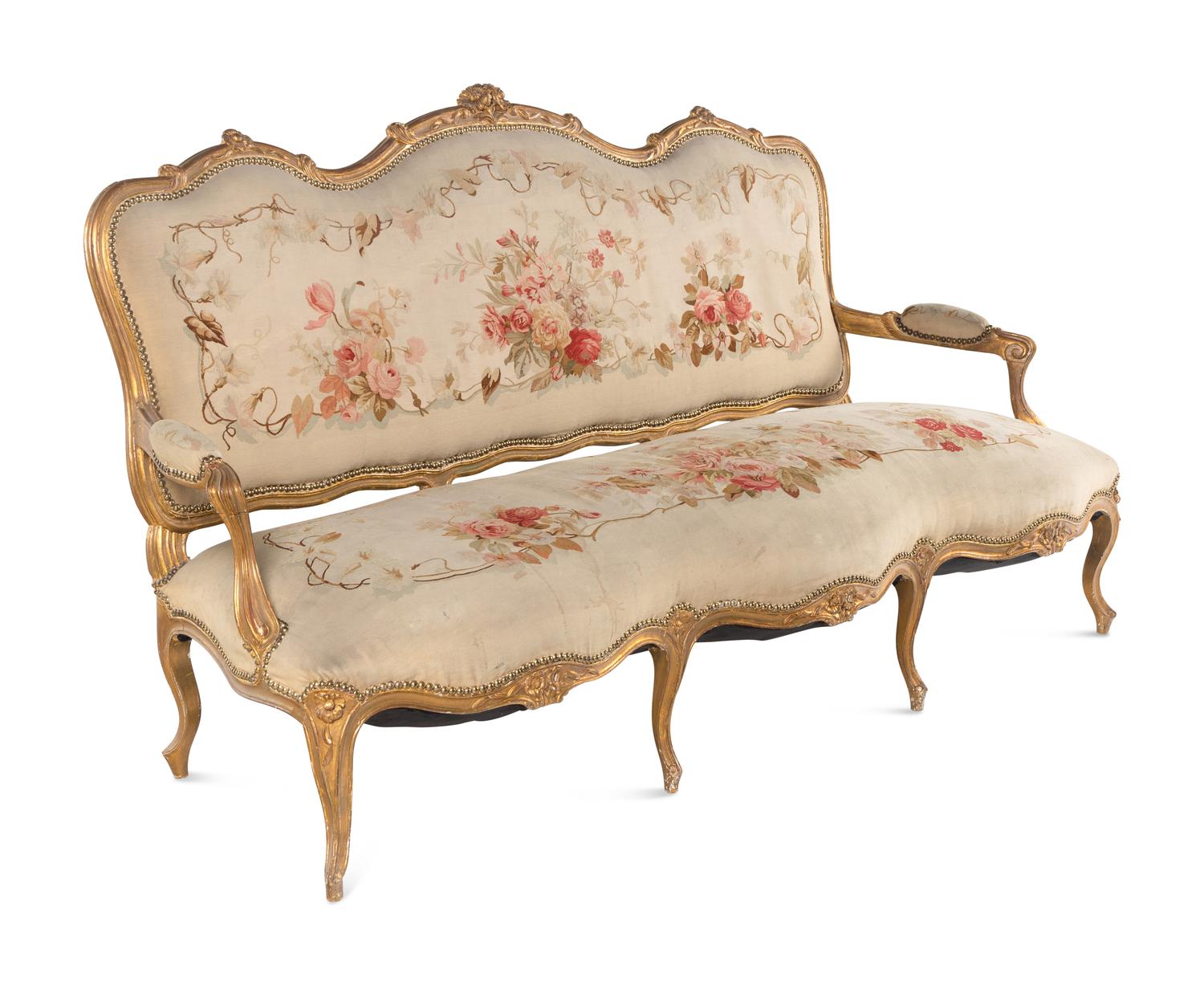 A Louis XV Style Giltwood Seven-Piece Salon Suite
