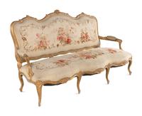 A Louis XV Style Giltwood Seven-Piece Salon Suite