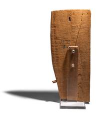 An Egyptian Painted Wood Sarcophagus Fragment with Anubis