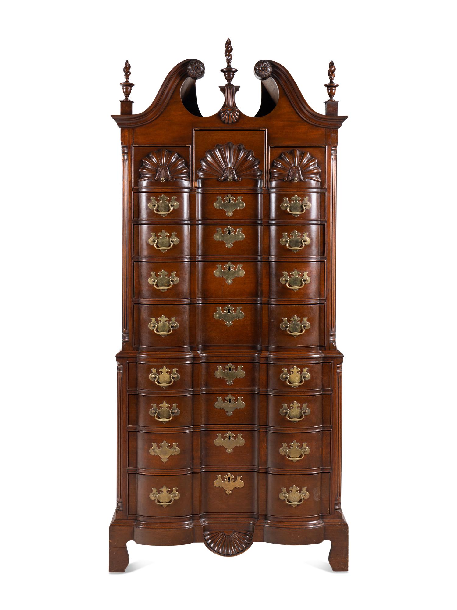 A Chippendale Style Shell and Rosette Carved Mahogany Block Front Chest-On-Chest