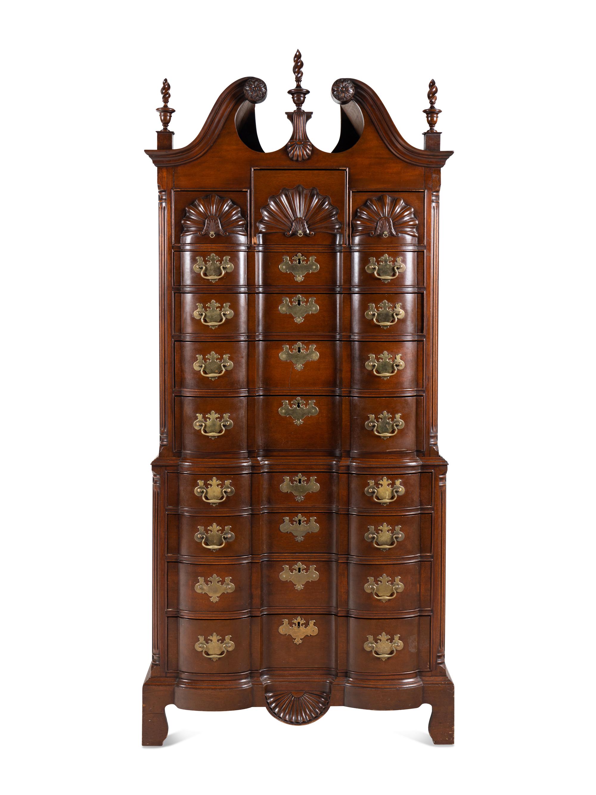 A Chippendale Style Shell and Rosette Carved Mahogany Block Front Chest-On-Chest