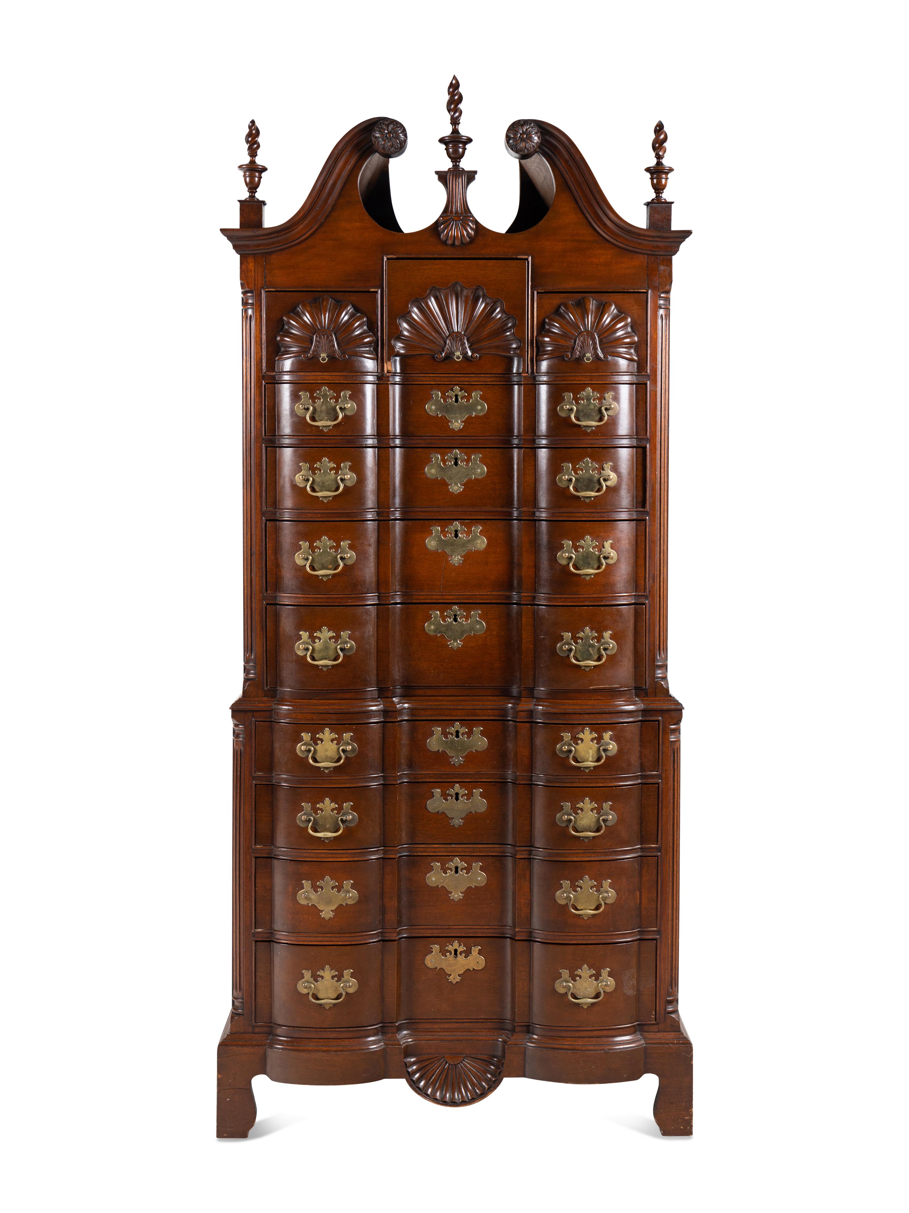A Chippendale Style Shell and Rosette Carved Mahogany Block Front Chest-On-Chest