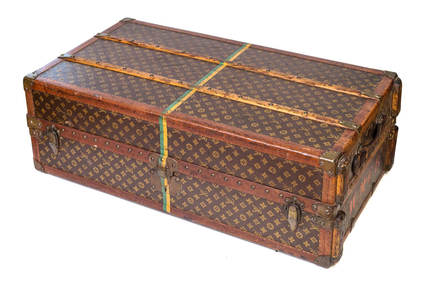 A Louis Vuitton Vuittonite Leather Steamer Trunk, 39.25" x 21.25" x 13".