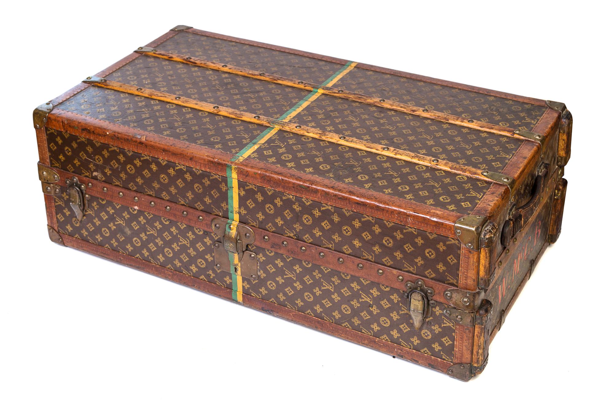 A Louis Vuitton Vuittonite Leather Steamer Trunk, 39.25" x 21.25" x 13".