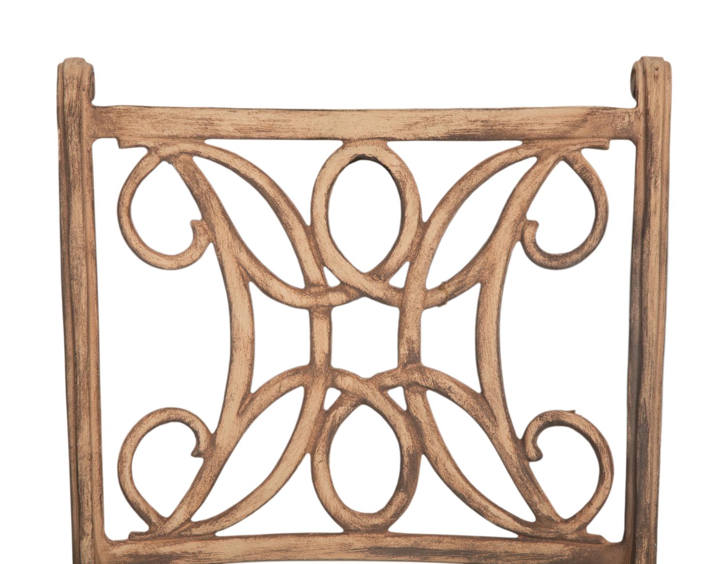 A Pair of Patinated Metal Garden Chairs and Side Table