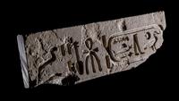 An Egyptian Limestone Relief Fragment with a Cartouche for the Pharaoh Inyotef II