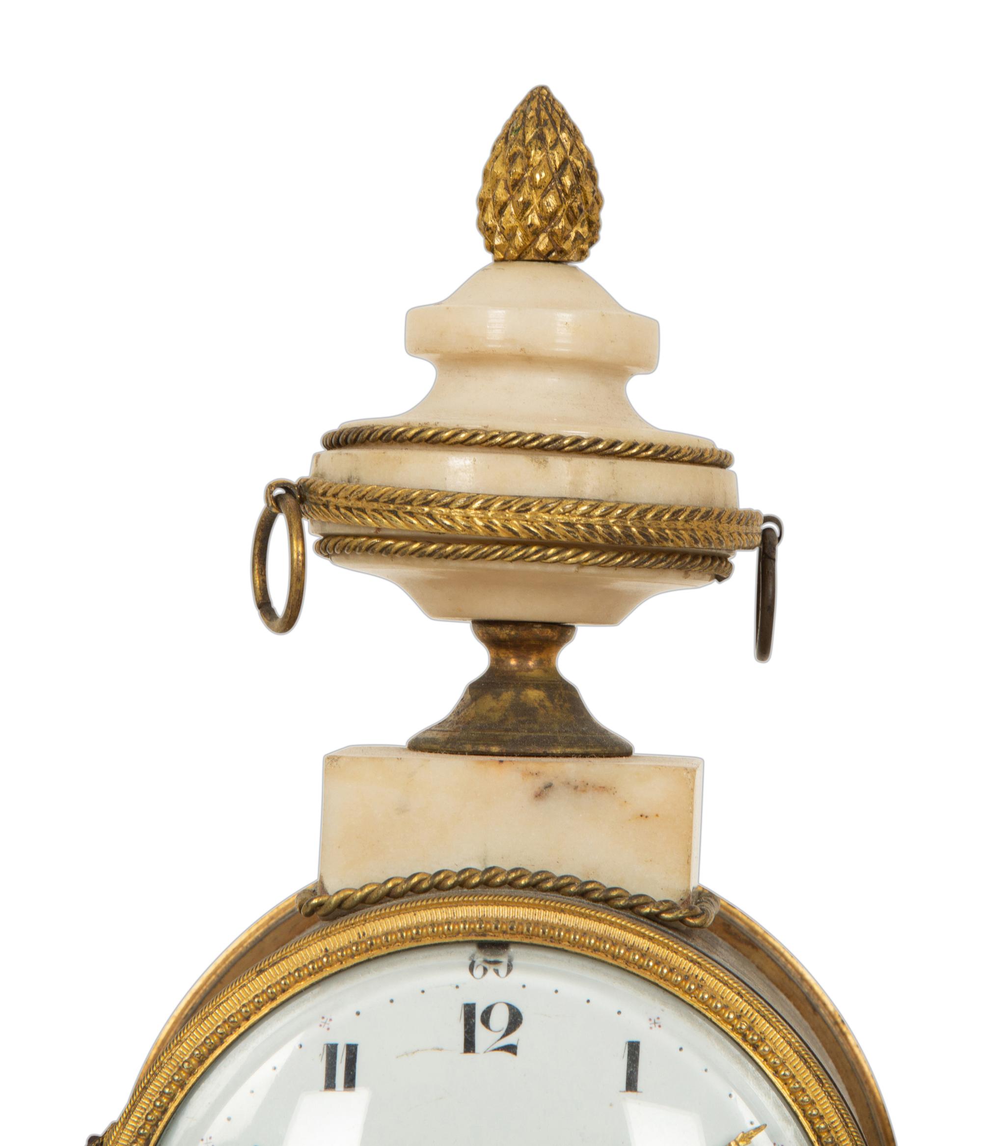 A Neoclassical White Marble and Gilt Bronze Portico Clock