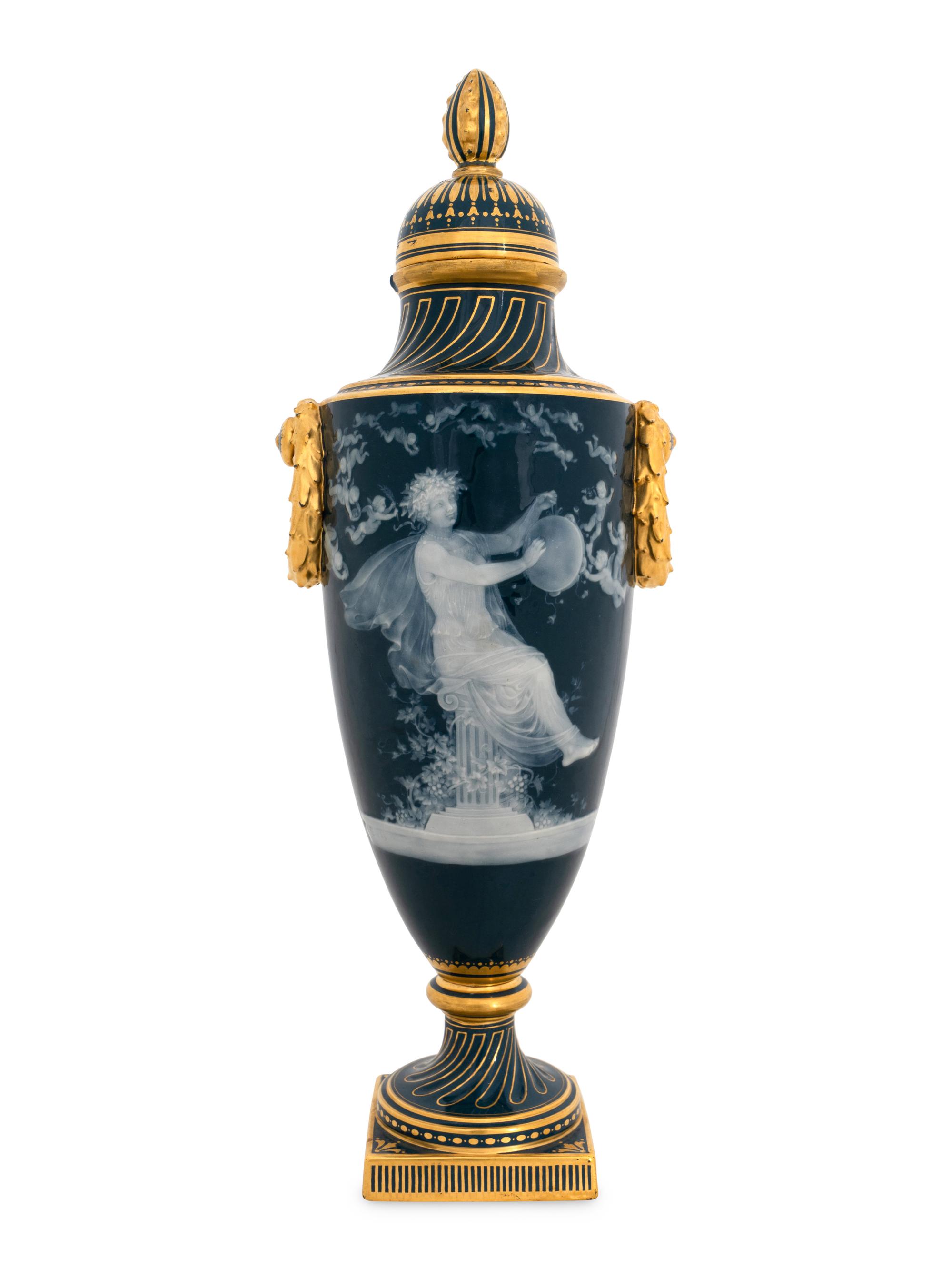 A Mintons Pâte-sur-Pâte Peacock Blue-Ground Vase and Cover
