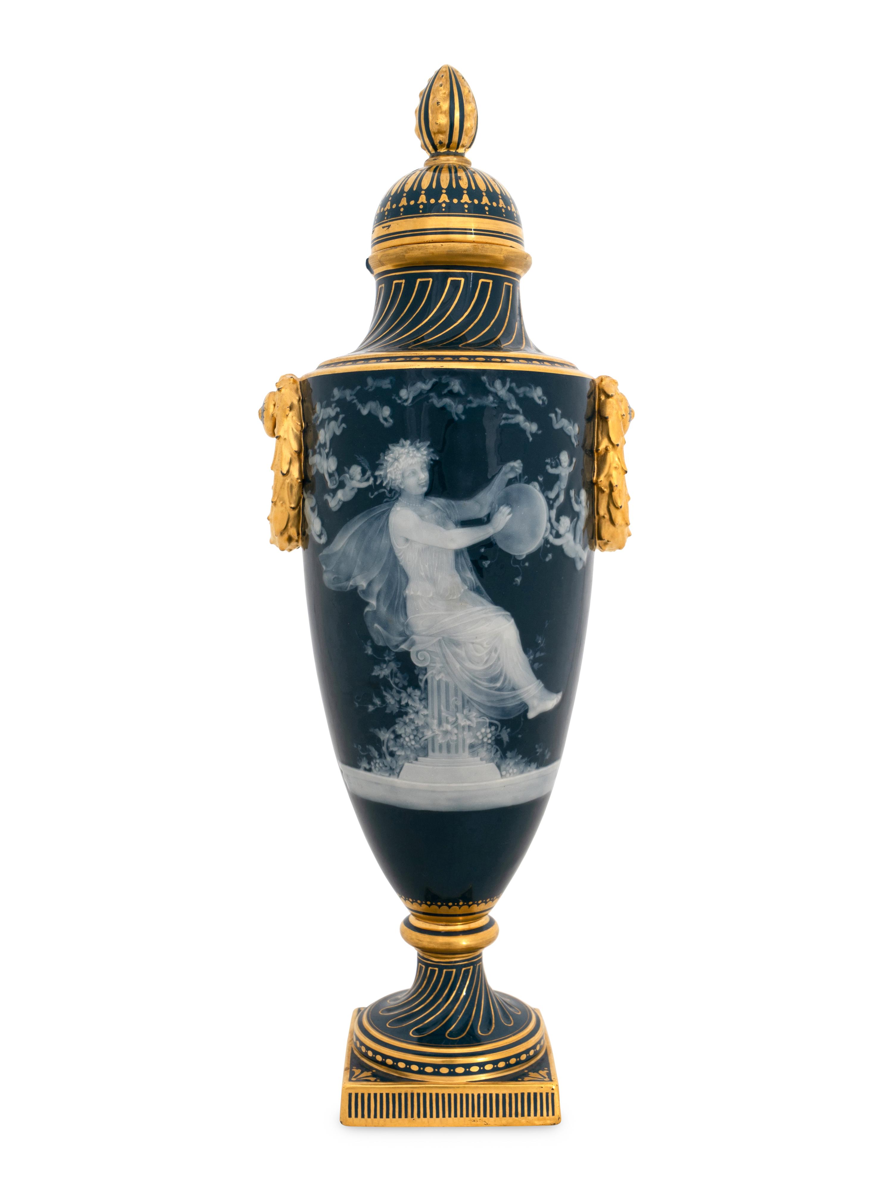 A Mintons Pâte-sur-Pâte Peacock Blue-Ground Vase and Cover
