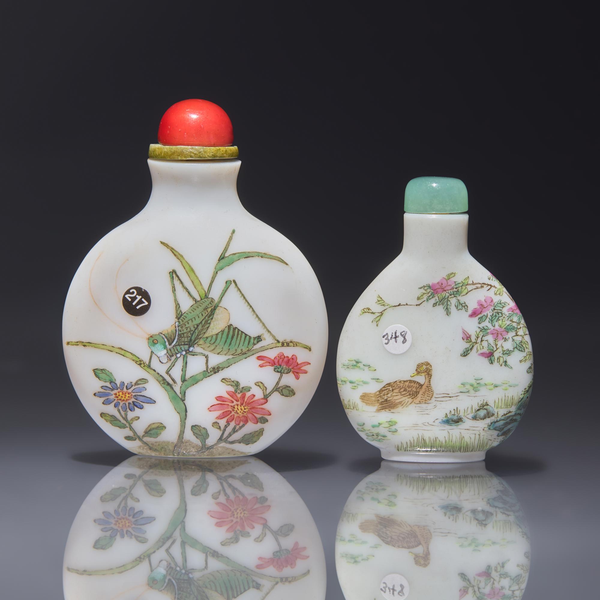 Two Chinese Enameled Glass Snuff Bottles, Circa 1780-1850 and Probably 20th Century — 清中晚期及更晚 白料胎畫琺瑯鼻煙壺兩支